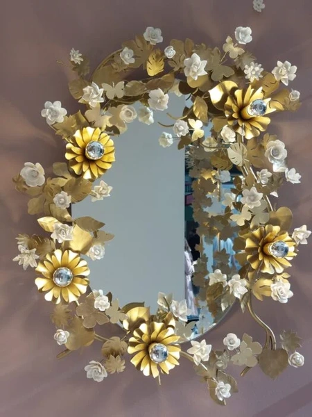 Oval mirror with flowers, leaves and butterflies